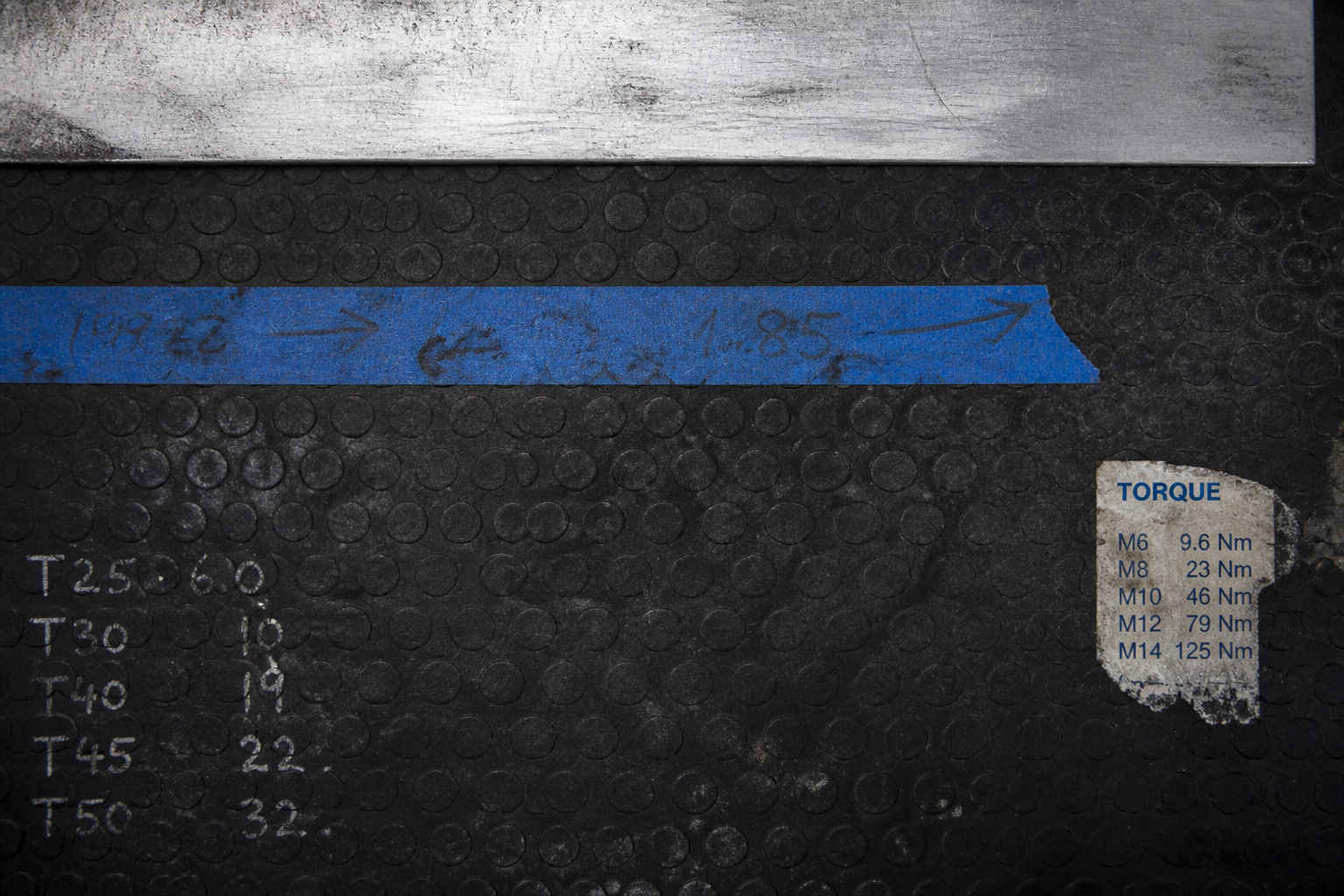 Rubber workbench texture with workshop tape and correction marks